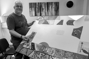 Care home chef Robert with artwork