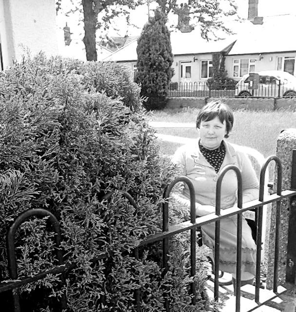 Carer looks after garden for person she supports