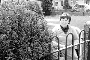 Carer looks after garden for person she supports