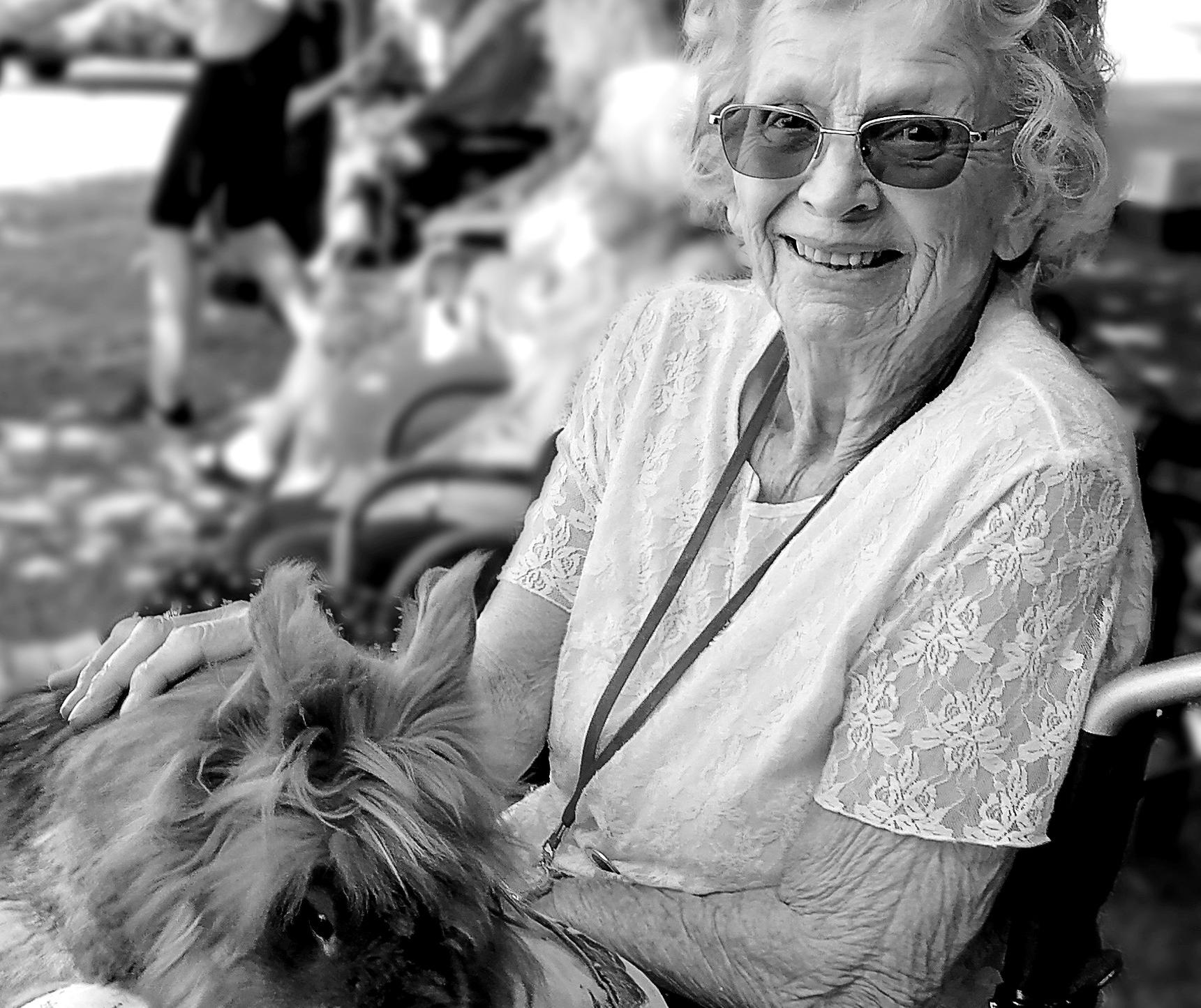 woman at care home with animal